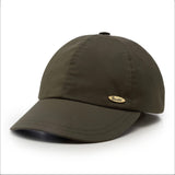 Bram, green baseball cap for women, in water repellent rain fabric