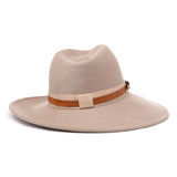 Frederique is a wide brim, side sweep felt hat for women in manilla beige