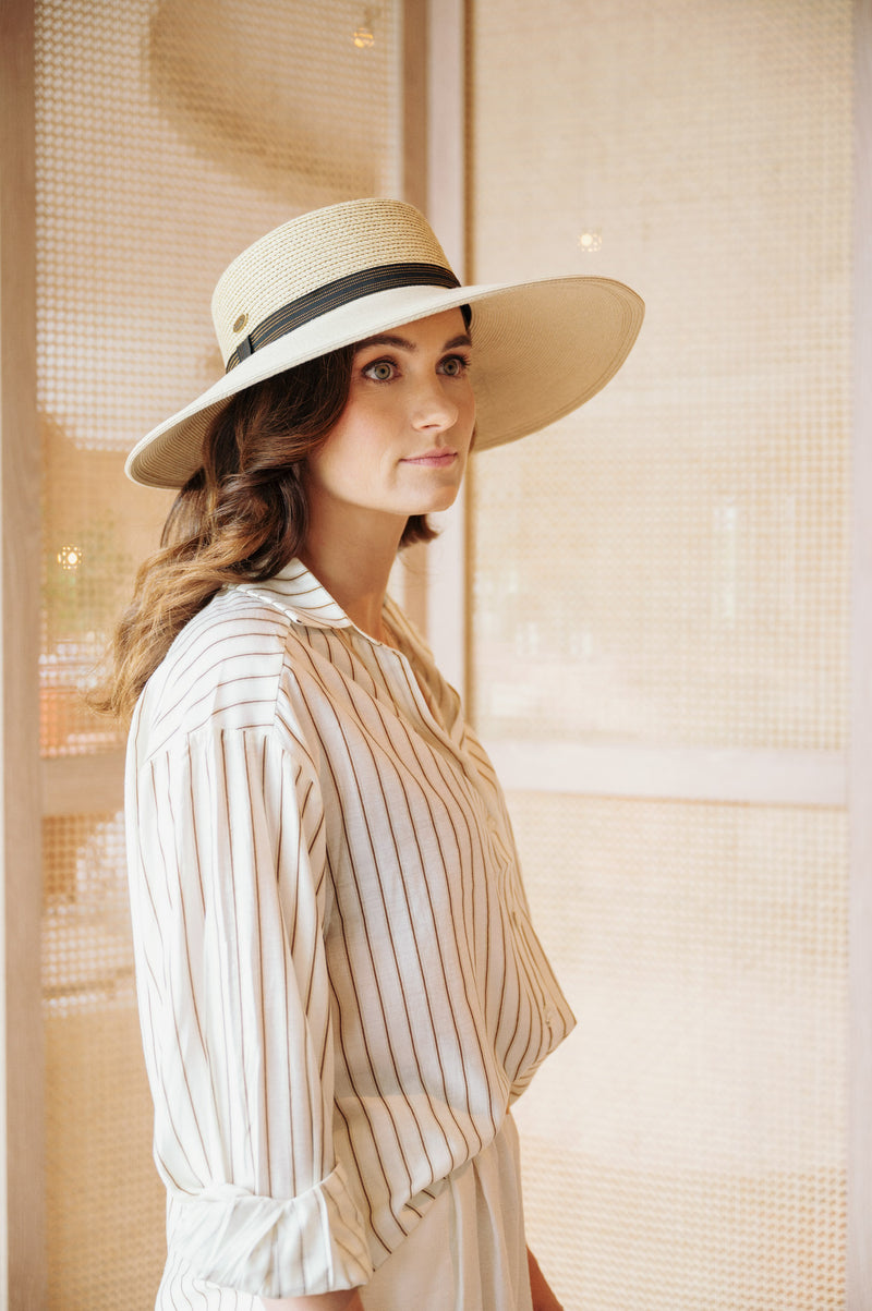Bronte wears the new Boater hat for women-Harper-in natural hue-SPF50