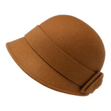 Bronte-Sophia- cloche hat in wool felt, with bow. In cinnamon brown tone