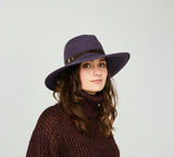 Frederique is a wide brim, side sweep felt hat for women 